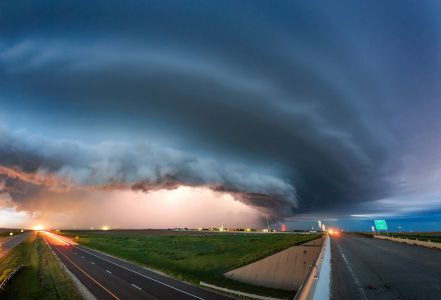 The End is Near by Marko Korosec (Colby, Kansas, USA). A supercell storm rolling over interstate I70, taken during blue hour.
