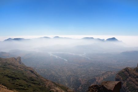 Winter Day by Devendra Kulkarni (Kalsubai Peak, India). Taken from summit of the Kalsubai Peak - the highest peak in Maharashtra State, India with height of 1,646 m. The mountain is a part of the Western Ghats, a UNESCO world heritage site famous for its heavy rainfall during monsoon and biodiversity.